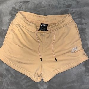Orange Nike sweatshorts